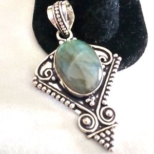 Man's gorgeous 30ct natural labradorite pendant